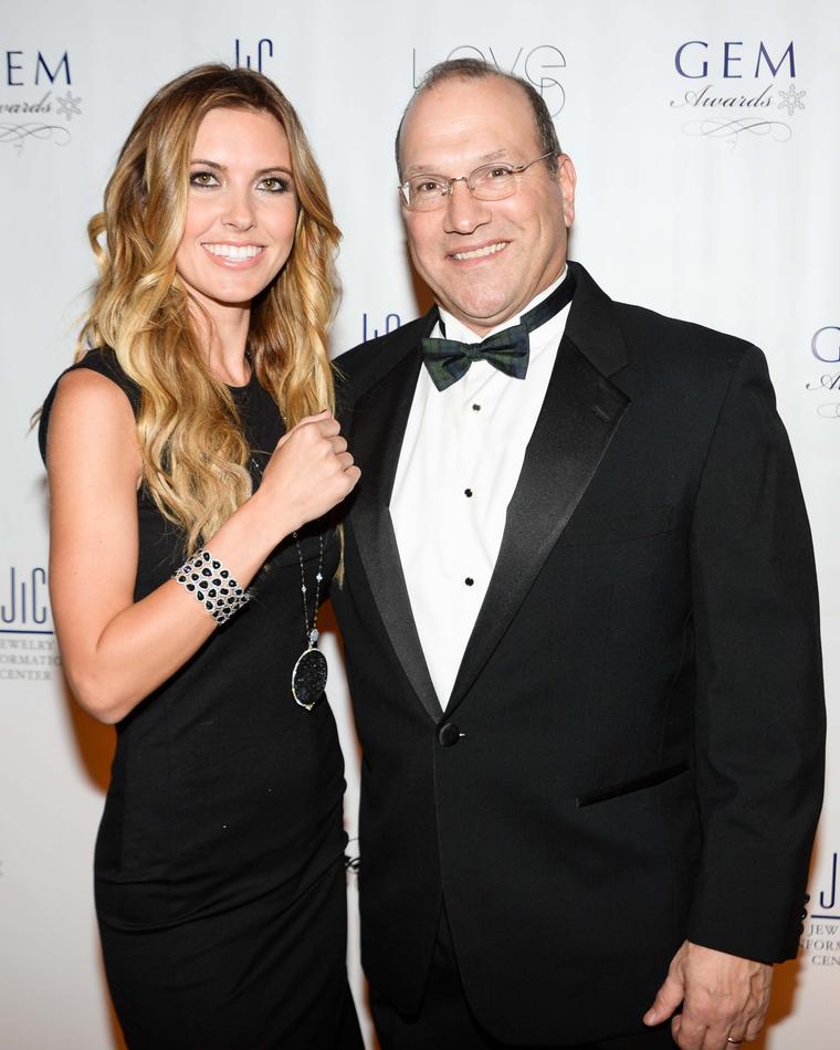 US TV presenter Audrina Partridge with David J. Bonaparte, CEO of Jewelers of America, at the 2014 GEM Awards in New York.